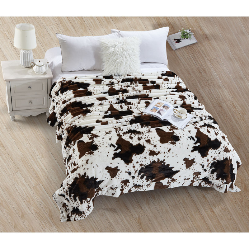 Loon Peak® Marlborough Cow Print Throw & Reviews Wayfair
